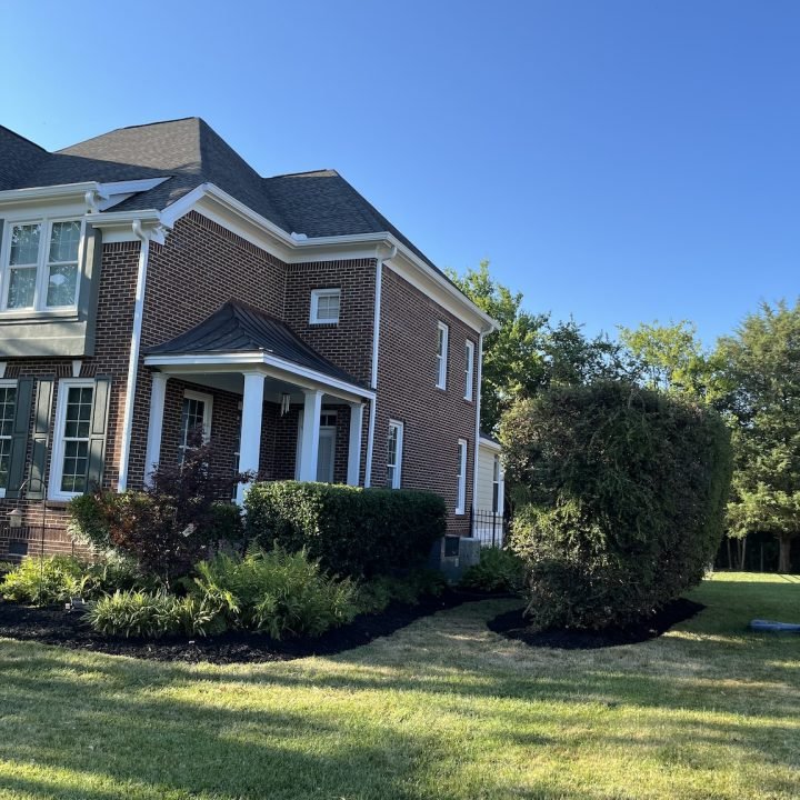 Landscaping and mulch installation project by The Stone Landscaping